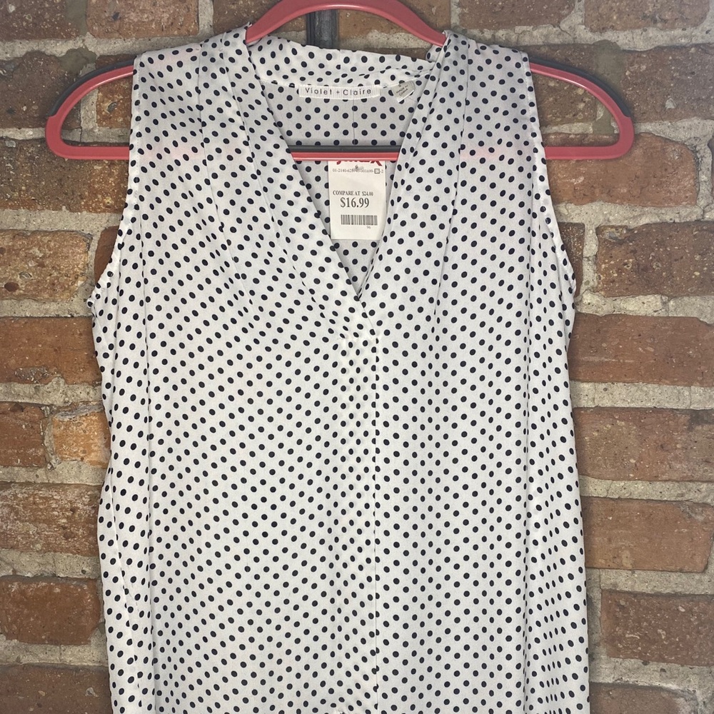 White with black polka dot blouse